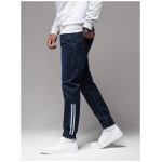 Jedinečné tmavo modré rifľové joggery s pásmi po bokoch PADJ-0156 - S